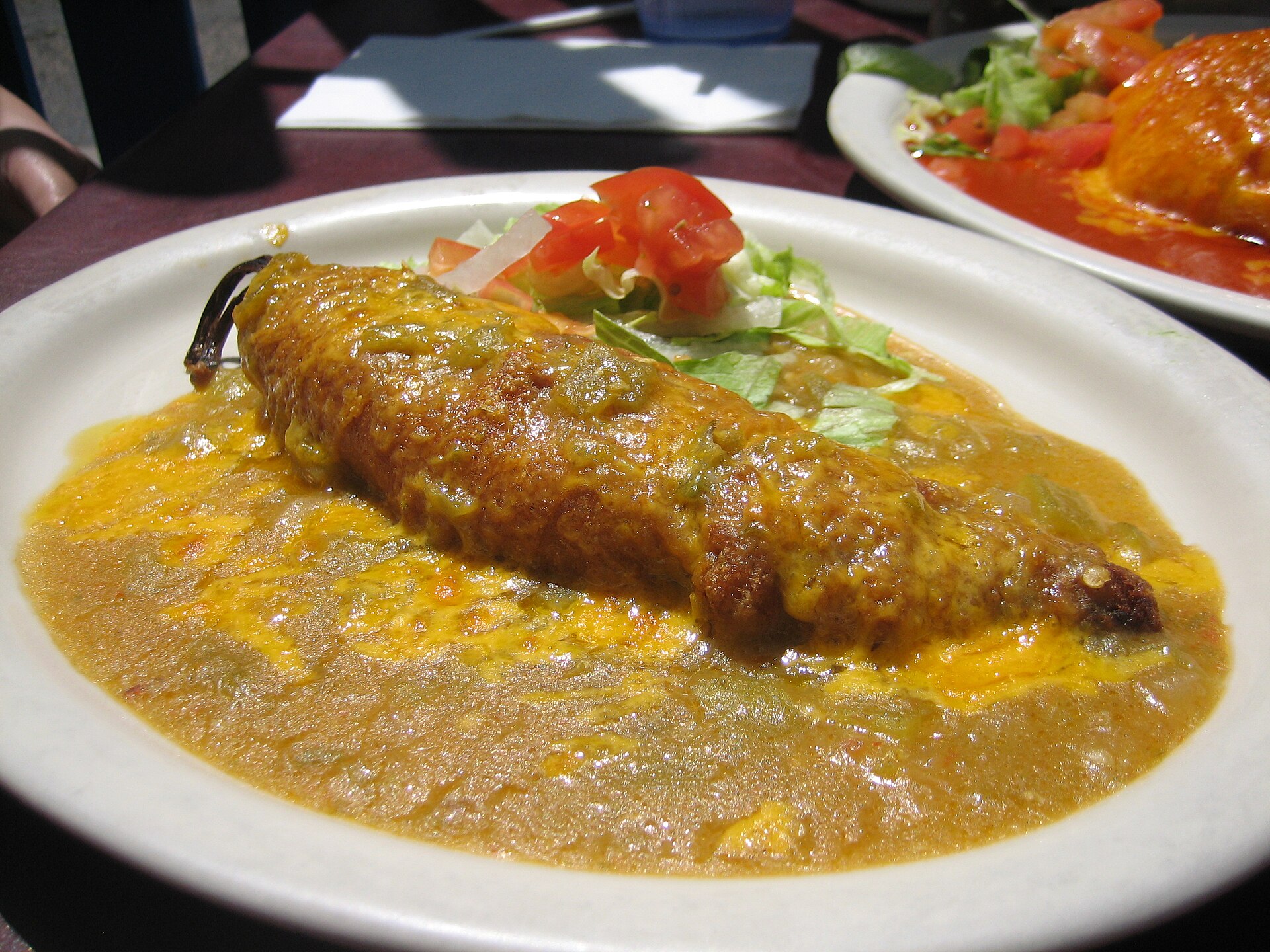 Chile relleno smothered in green chile sauce