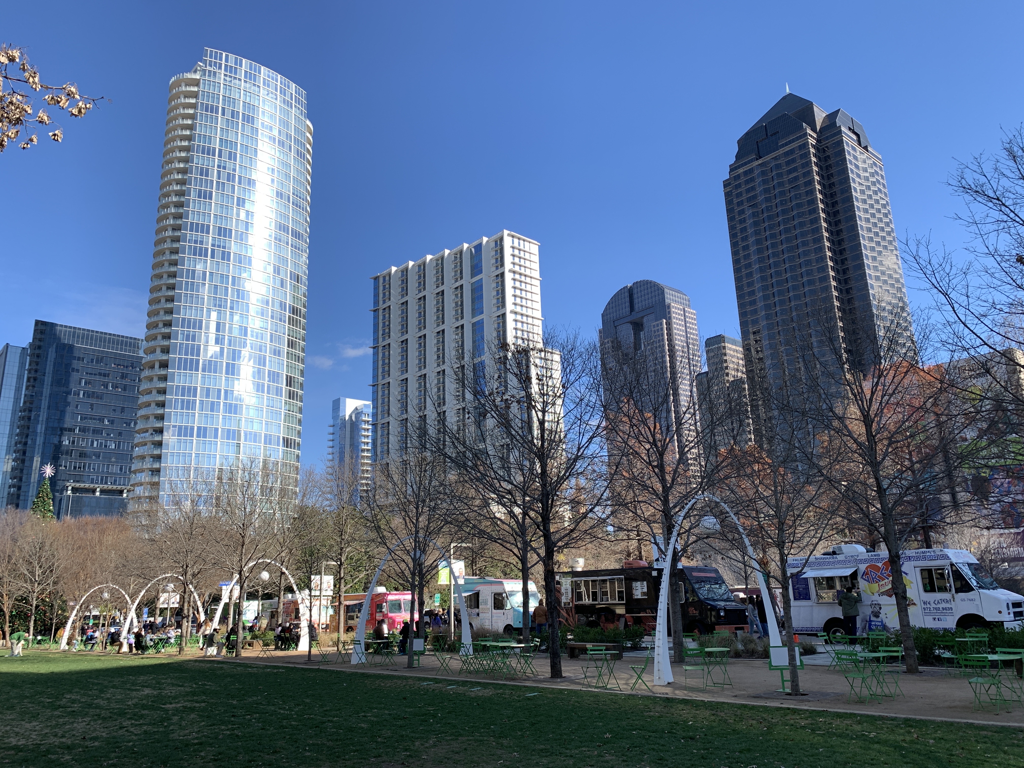 People enjoying the sunshine at Klyde Warren Park in downtown Dallas