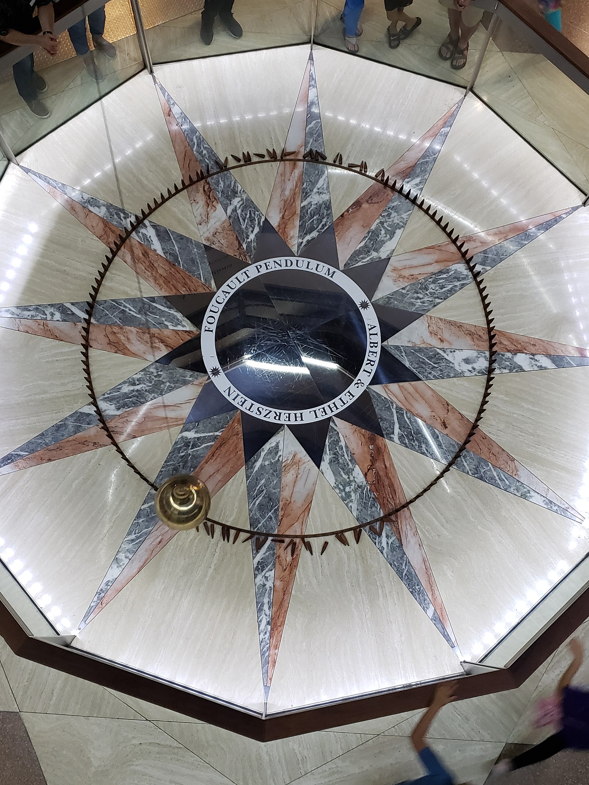 The Foucault pendulum hanging in the Houston Museum of Natural Science